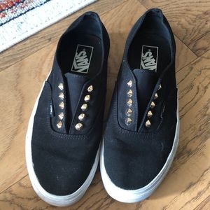 Black studded vans.